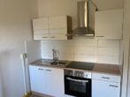 1-Raum-Wohnung mit Küchenmöbel im Erdgeschoss zu vermieten - Bild
