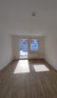 Top sanierte Zwei-Raum-Wohnung mit Balkon - Musterfoto Wohnzimmer mit Balkon