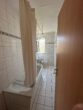 Zwei-Raum-Wohnung mit Balkon im Puschkinweg - Badezimmer