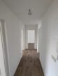 Vollsanierte 3-Raum-Wohnung mit Balkon - Flur
